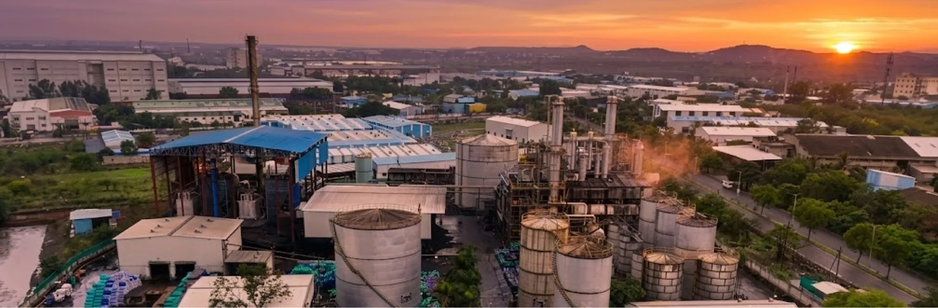 OfBusiness chemical processing plant at dusk